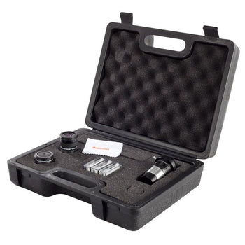 Celestron Observer's Accessory Kit in a black plastic carry case with foam lining, containing telescope eyepieces, a barlow lens, filters, and a cleaning cloth.